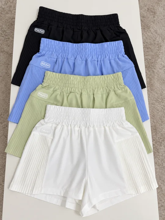 Short duplo lateral plissado