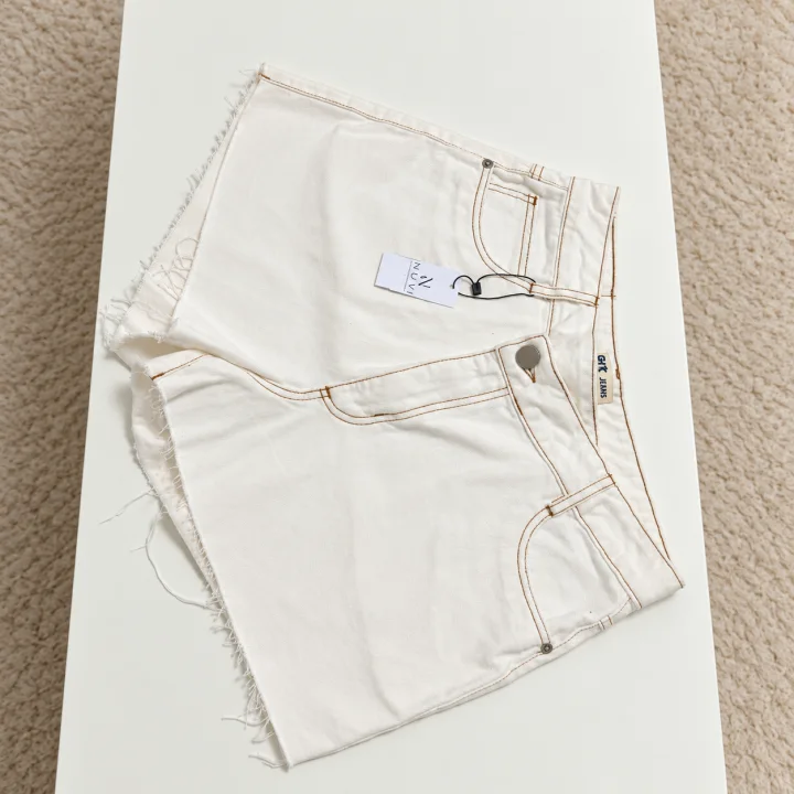 Short jeans assimétrico