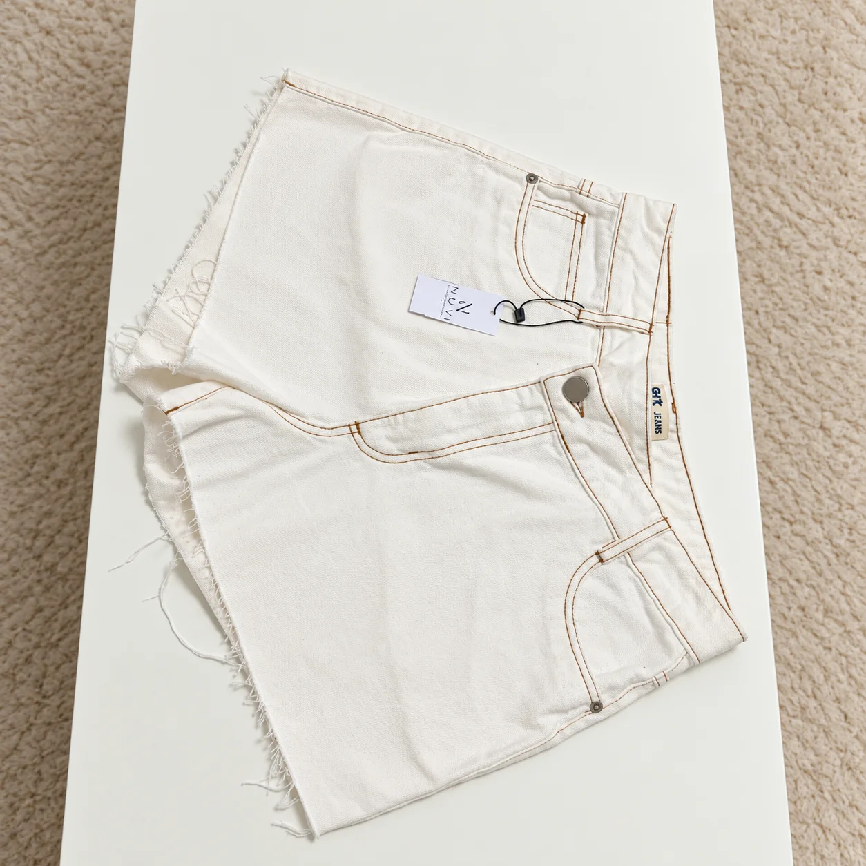 Short jeans assimétrico